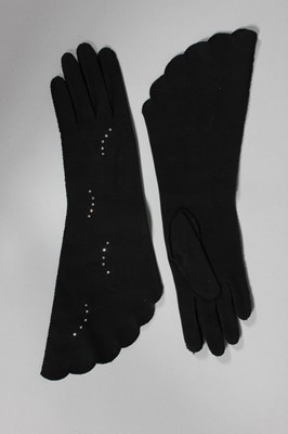 Lot 91 - A pair of Schiaparelli black suede-effect...