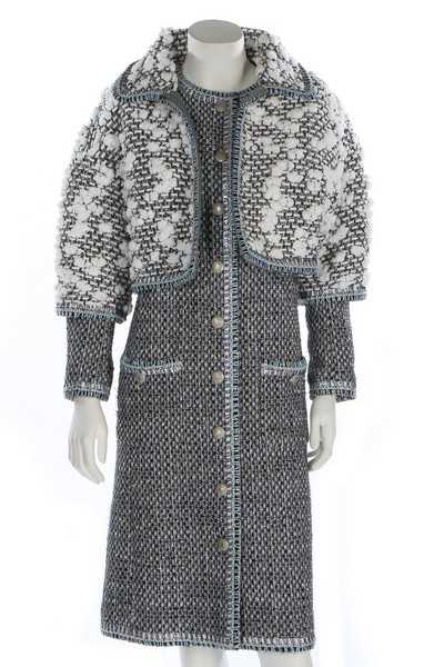 Lot 47 - A Chanel silver tweed ensemble trimmed with...