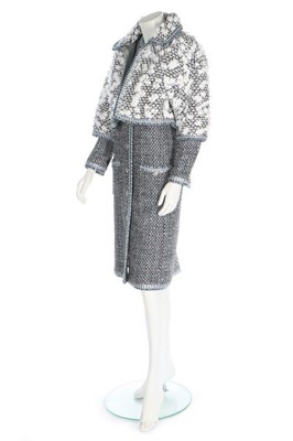 Lot 47 - A Chanel silver tweed ensemble trimmed with...
