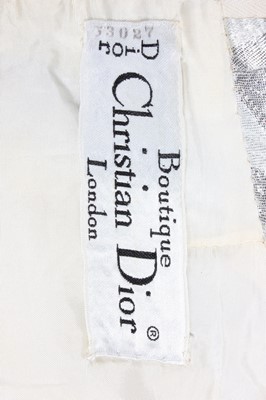 Lot 55 - A Christian Dior New York silver lame...