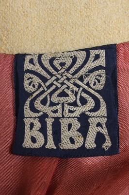 Lot 114 - A Biba mustard wool maxi-coat, late 1960s,...