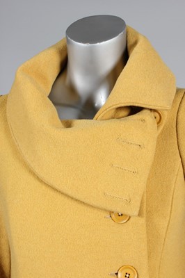 Lot 114 - A Biba mustard wool maxi-coat, late 1960s,...