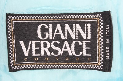 Lot 122 - A Gianni Versace powder blue wool suit, 1990s,...
