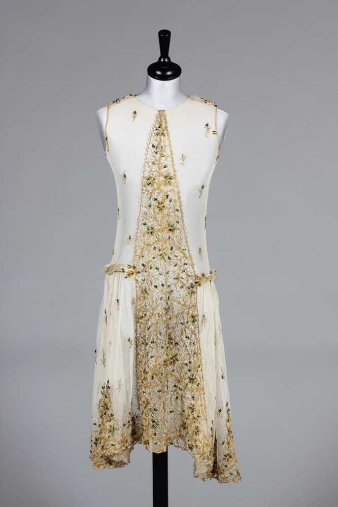 Lot 130 - An ivory tulle and beetle-wing adorned dress,...