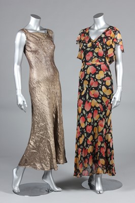 Lot 143 - Three 1930s dresses, comprising gold bias cut...