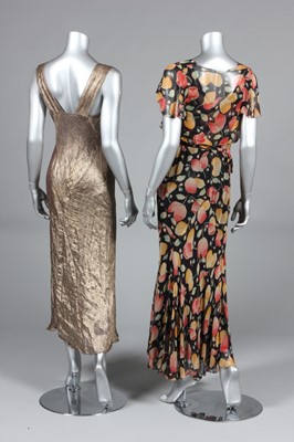 Lot 143 - Three 1930s dresses, comprising gold bias cut...
