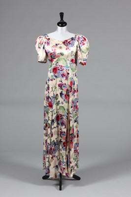 Lot 143 - Three 1930s dresses, comprising gold bias cut...