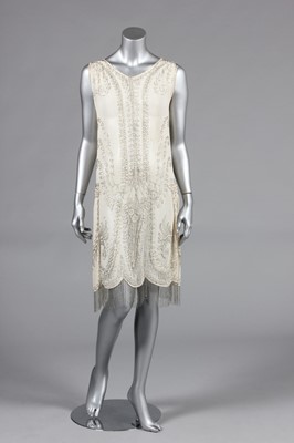 Lot 198 - A beaded muslin flapper/bridal dress circa...