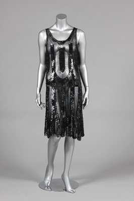 Lot 199 - A black sequined and beaded flapper dress,...