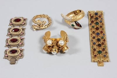 Lot 213 - A group of bracelets and bangles, modern,...