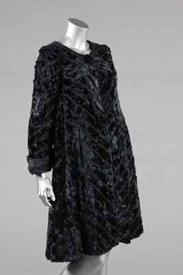 Lot 230 - A Biba black moss crepe evening gown, circa...