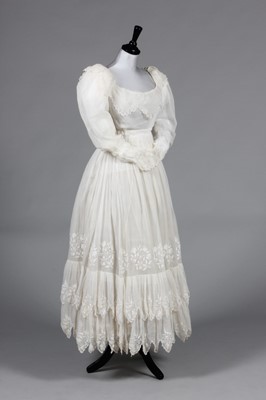 Lot 237 - An embroidered muslin summer dress, late 1820s-...