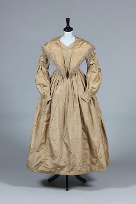 Lot 238 - A golden-brown taffeta gown, probably a bridal...