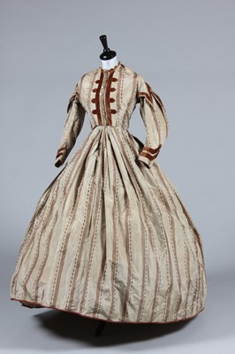 Lot 239 - A striped brown and ivory chine taffeta gown...