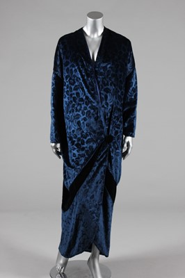 Lot 250 - An embossed blue velvet cocoon coat, circa...