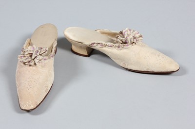 Lot 252 - A pair of Bon Marche ivory silk mules trimmed...