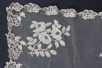 Lot 402 - A Honiton lace bridal shawl or veil, circa...