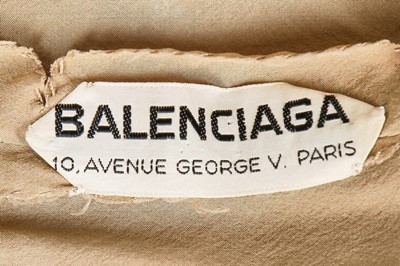 Lot 136 - A Balenciaga couture sand-brown lace cocktail...