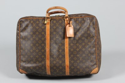 Lot 277 - A Louis Vuitton soft-sided suitcase, of LV...