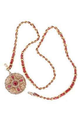Lot 8 - A Chanel belt with jewelled medallion pendant,...