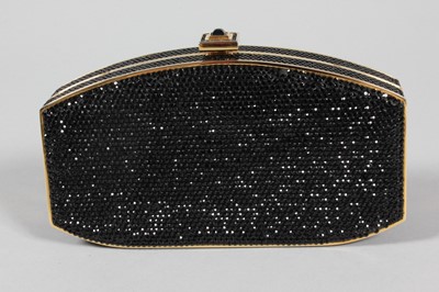 Lot 280 - A Judith Leiber black beaded minaudiere, 1980s,...