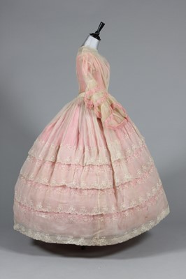 Lot 283 - A tamboured white organdie gown circa 1850,...