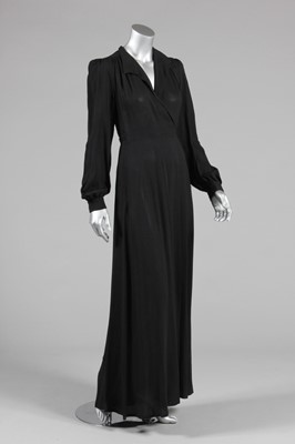 Lot 285 - An Ossie Clark black crepe wrap-around...