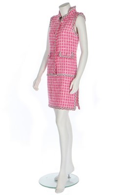 Lot 49 - A Chanel shocking-pink tweed dress, circa 2014,...