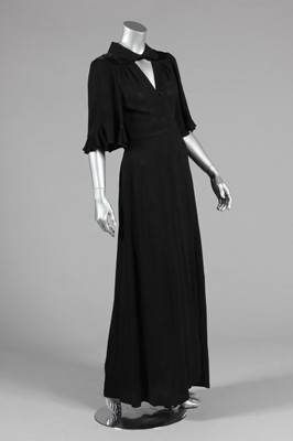 Lot 288 - An Ossie Clark black moss crepe and satin maxi...