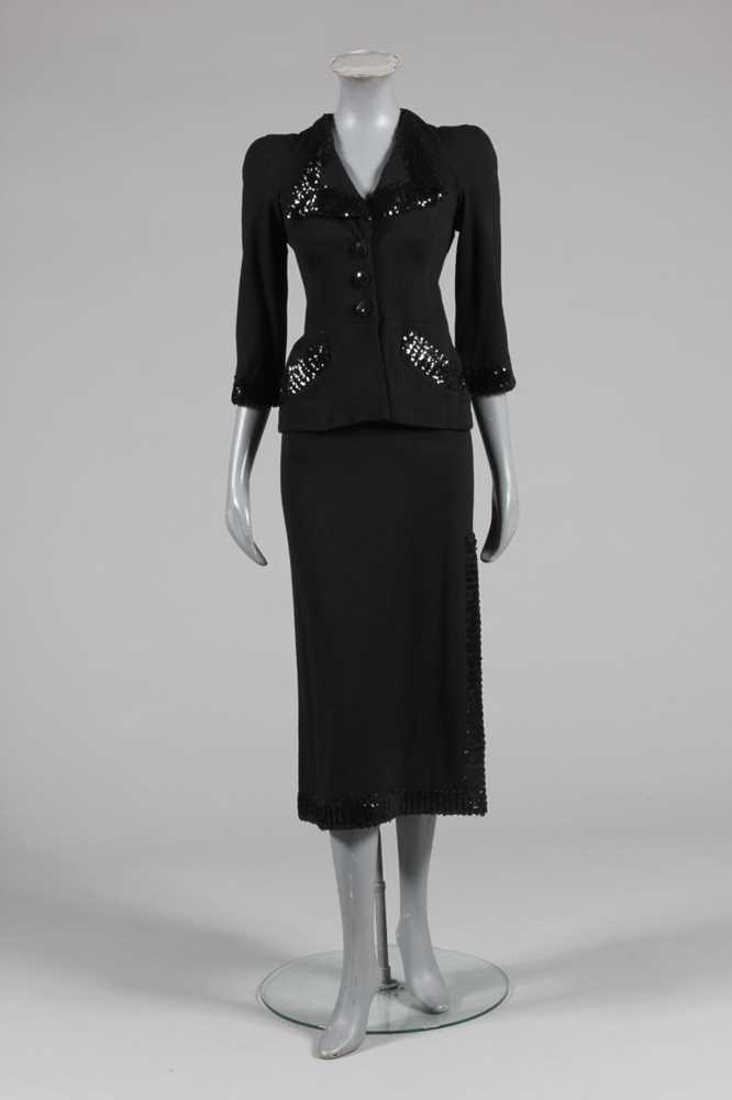 Lot 290 - A Biba sequined black jersey evening suit,...