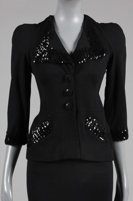 Lot 290 - A Biba sequined black jersey evening suit,...