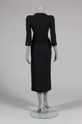 Lot 290 - A Biba sequined black jersey evening suit,...