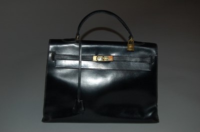 Lot 295 - An Hermès black box calf leather Kelly bag,...