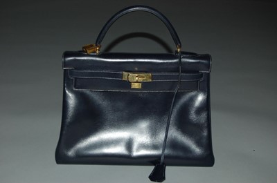 Lot 296 - An Hermès dark blue/purple box calf leather...