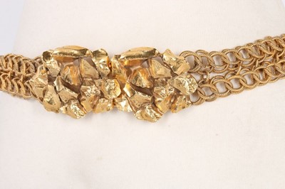 Lot 65 - An Yves Saint Laurent belt, with 'gold nugget'...