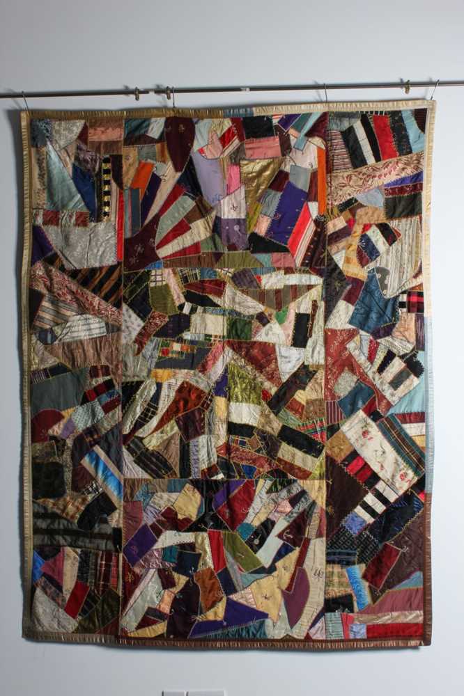 Lot 320 - A 'Crazy' patchwork, English, circa 1880-90,...