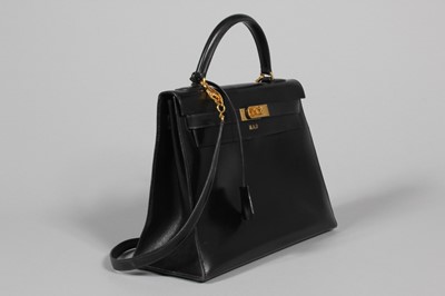 Lot 46 - An Hermès black box calf leather Kelly bag,...
