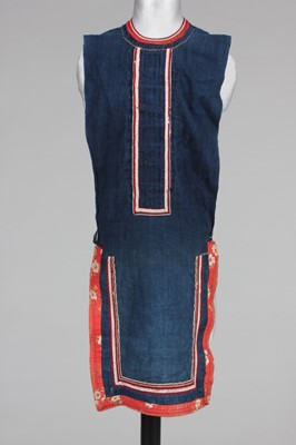 Lot 384 - A Turkmen elaborately adorned ceremonial tunic,...
