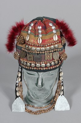 Lot 384 - A Turkmen elaborately adorned ceremonial tunic,...