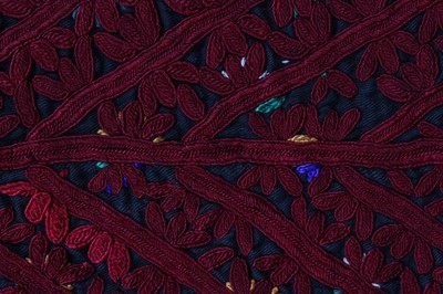 Lot 384 - A Turkmen elaborately adorned ceremonial tunic,...