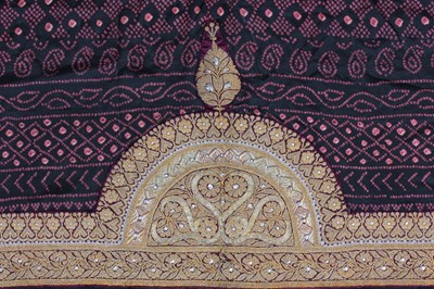 Lot 388 - Four silk saris, comprising: purple example...