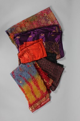 Lot 388 - Four silk saris, comprising: purple example...