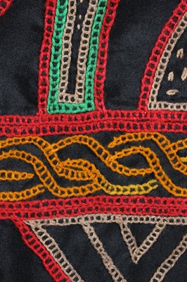 Lot 391 - A brightly embroidered kaftan, West African,...