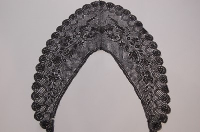 Lot 206 - Two black silk Maltese bobbin lace capelets,...