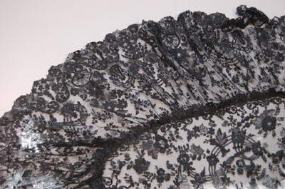 Lot 425 - Two black silk Maltese bobbin lace capelets,...