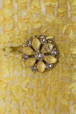 Lot 50 - A Chanel lemon-yellow cotton-tweed ensemble,...