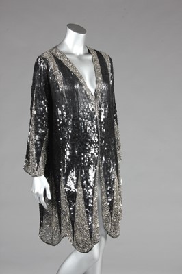 Lot 73 - A sequined evening coat and beret, late 1920s,...