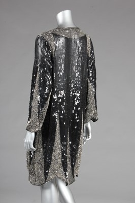 Lot 73 - A sequined evening coat and beret, late 1920s,...