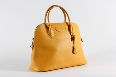 Lot 29 - An Hermès yellow epsom leather Bolide bag,...
