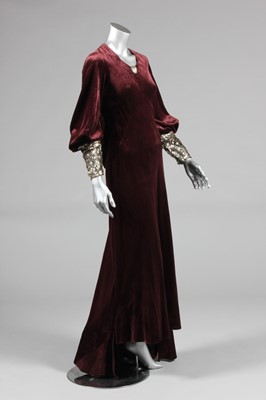 Lot 160 - 1930s evening gowns, comprising: plum velvet...